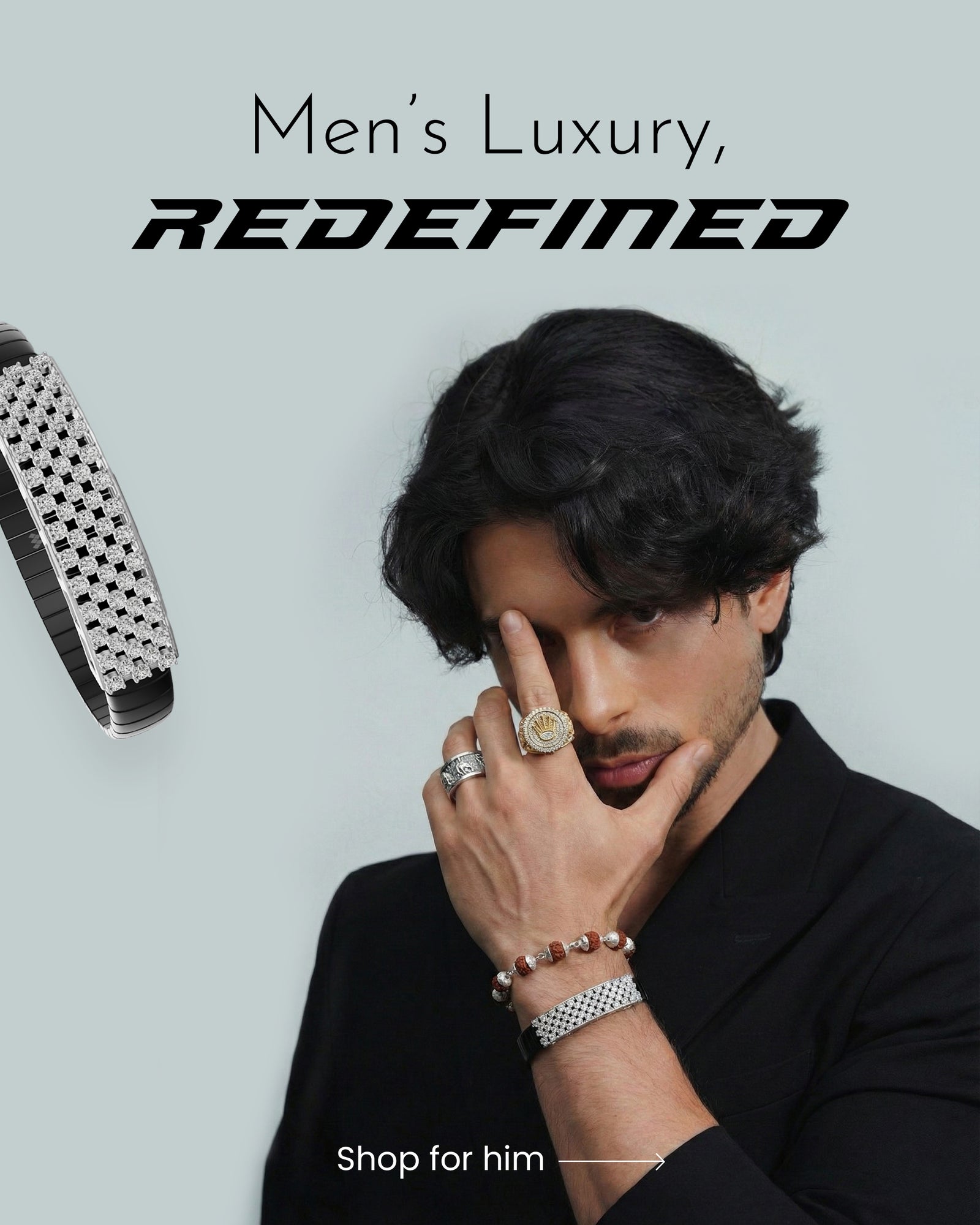 Man wearing jewelry with text 'Men's Luxury, REDEFINED' on a light gray background