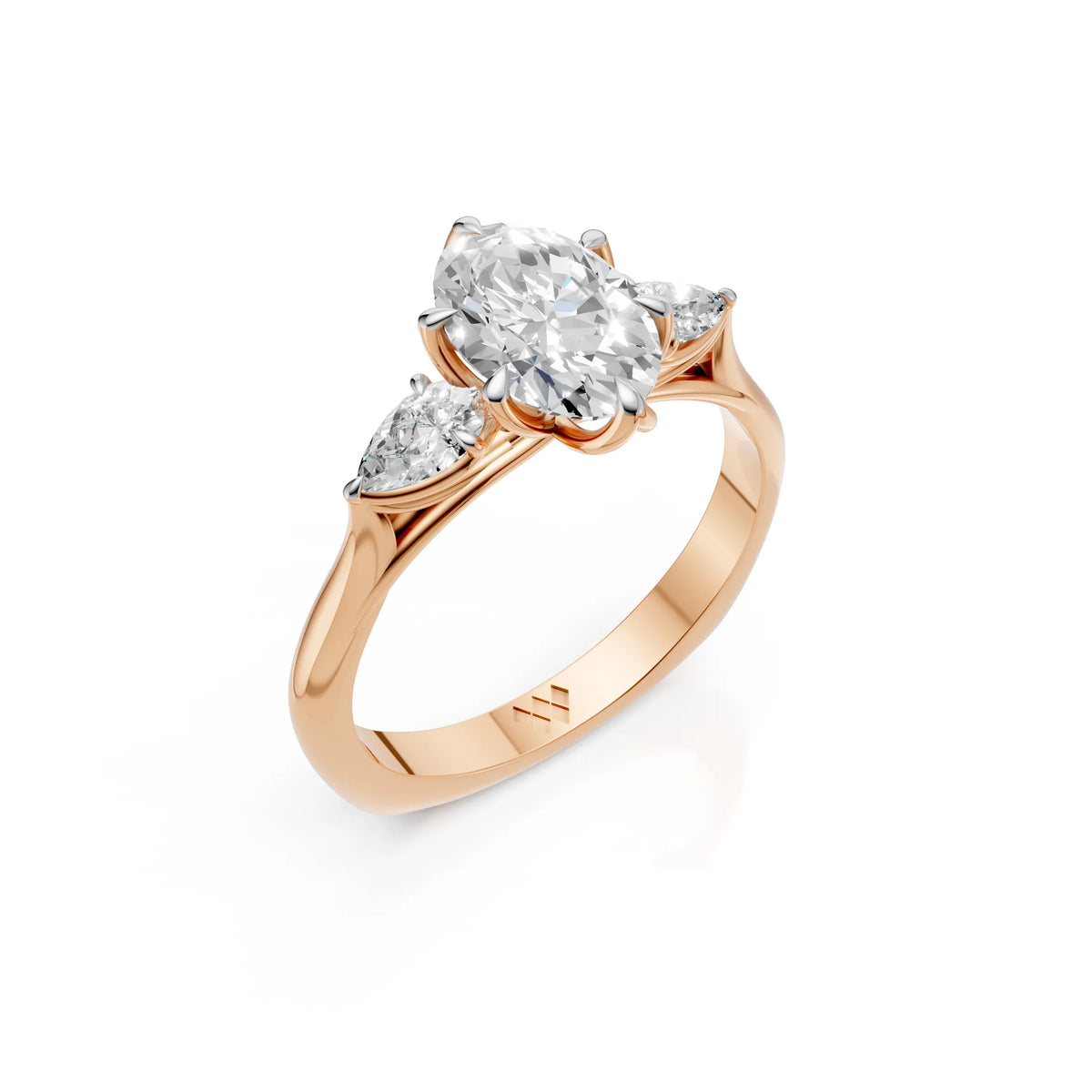 Oval Cut Diamond Three Stone Engagement Ring with Pear Side Diamonds