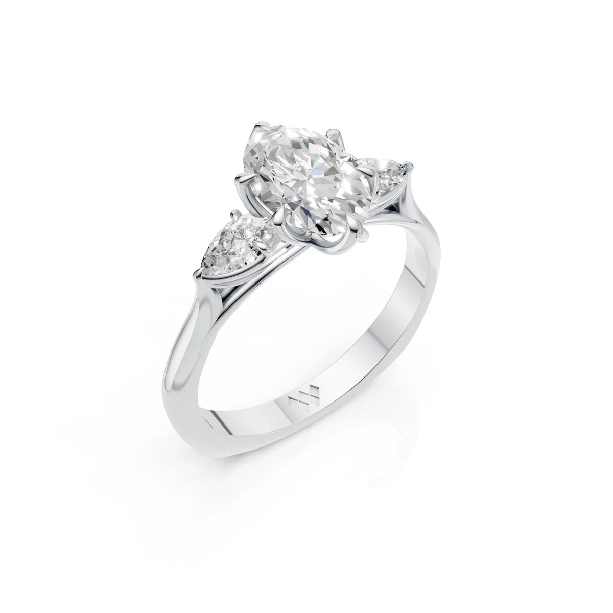 Oval Cut Diamond Three Stone Engagement Ring with Pear Side Diamonds