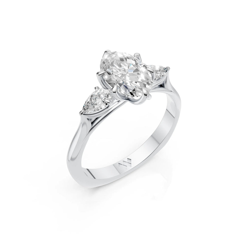 Oval Cut Diamond Three Stone Engagement Ring with Pear Side Diamonds