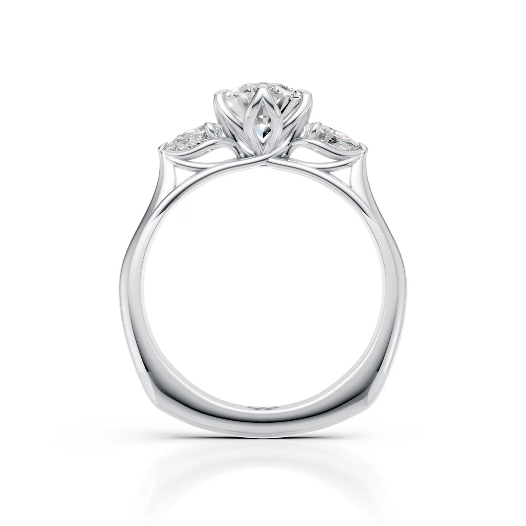 Oval Cut Diamond Three Stone Engagement Ring with Pear Side Diamonds