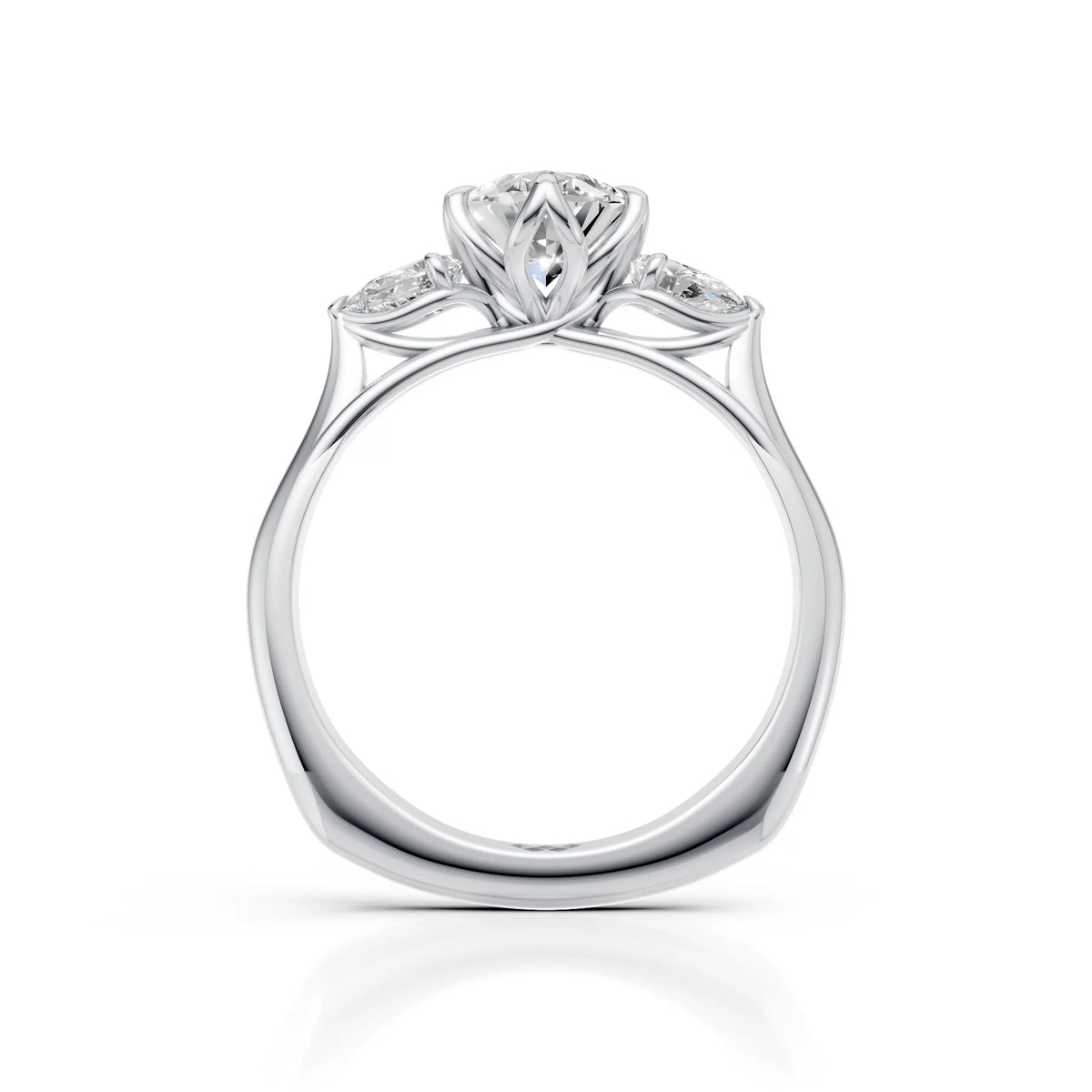 Oval Cut Diamond Three Stone Engagement Ring with Pear Side Diamonds